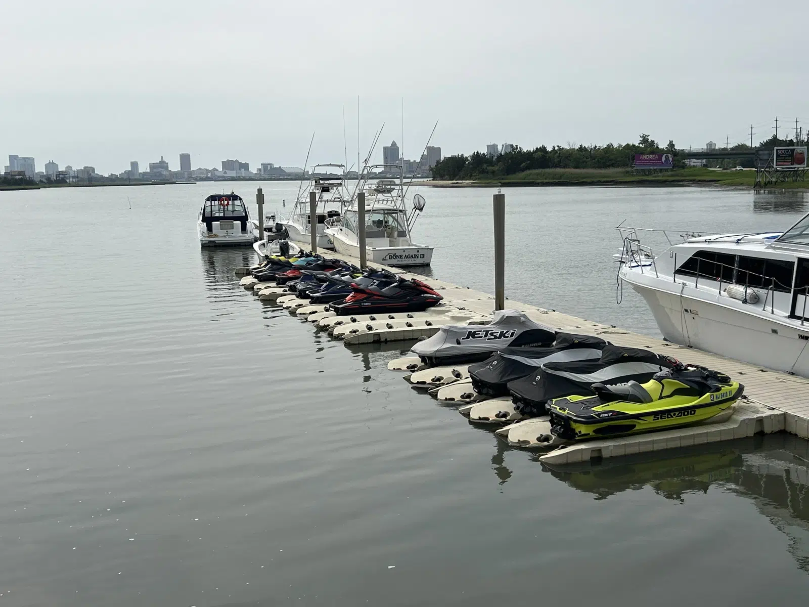 Row of jet skis moored at a waterfront dock — JetPro Powersport in Atlantic City